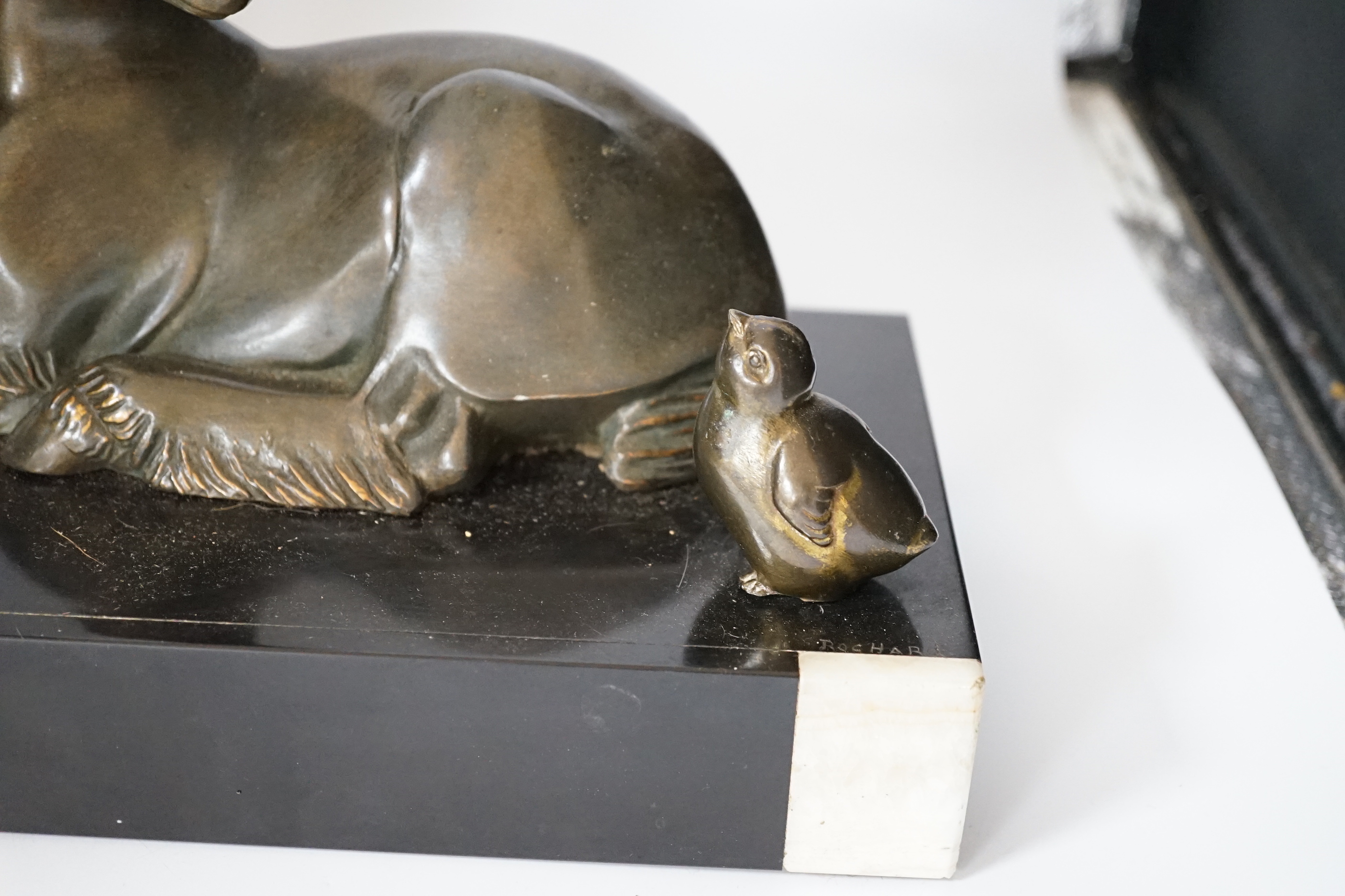 An Art Deco patinated spelter twin goat group on marble base, etched ‘Rochard’ on base, 36cm high